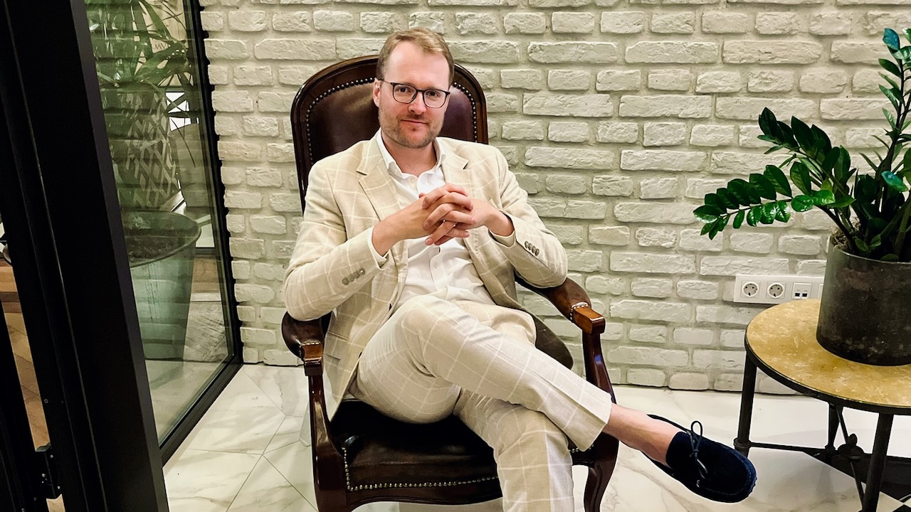 Max Wellenhofer in a chair.